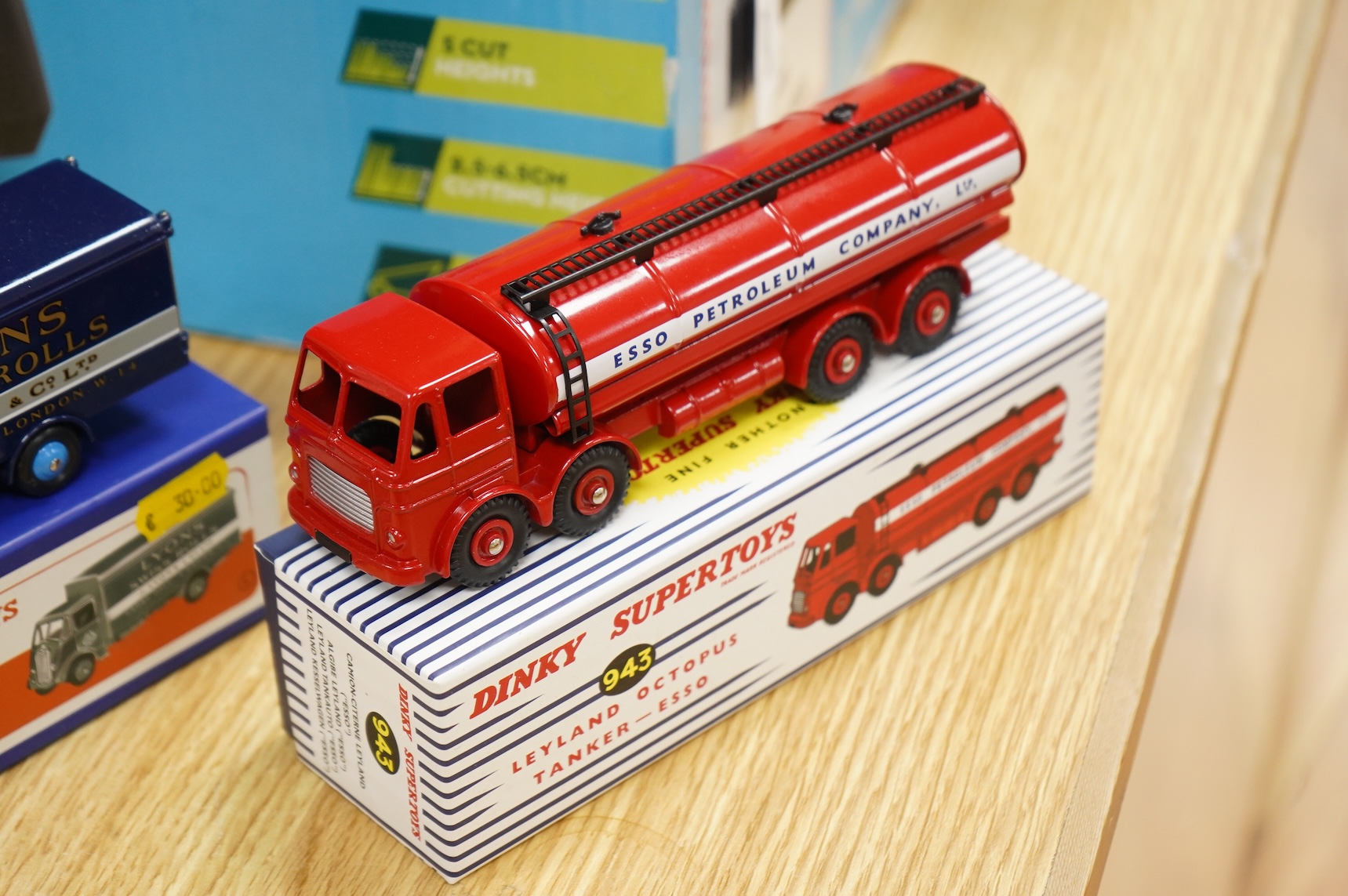 Twenty-two boxed Atlas Dinky Toys, including cars and commercial vehicles, Leyland tankers, a Foden wagon, sports cars, etc.